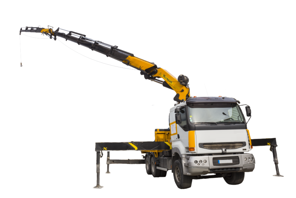 camion bras de levage en cours de manutention sur un chantier